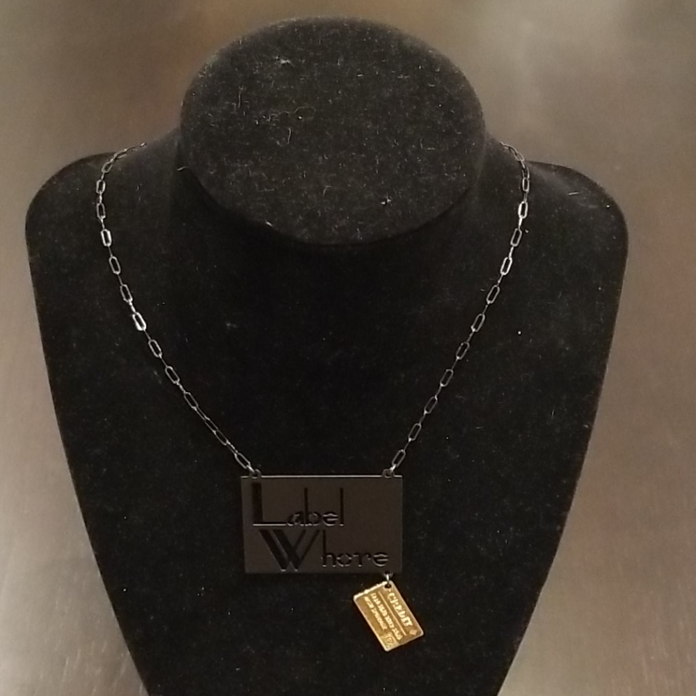 Noir, necklace phrase "Label Whore" black, new
